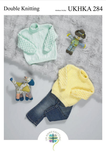 Baby Ribbed Sweater with cabled sleeves in lemon colour and baby Stocking Stitch Sweater with cabled sleeves in a mint colour.